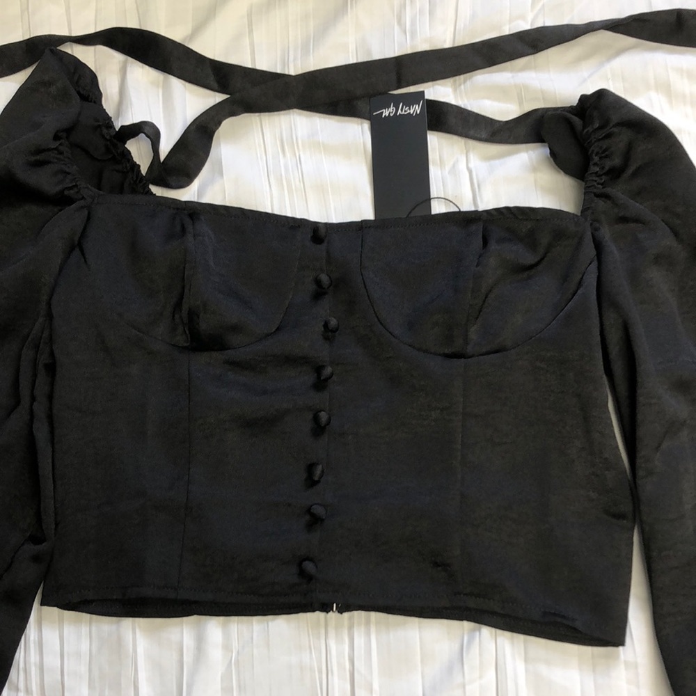 NWT Nasty Gal. Corset top with puff sleeves. Tie back and zipper. Size 6
